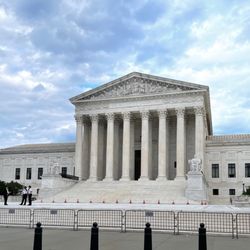 Photo of Supreme Court of the United States - Washington, DC, DC, US. Scaffolding and gates are up with guards patrolling the entrances. Sad.